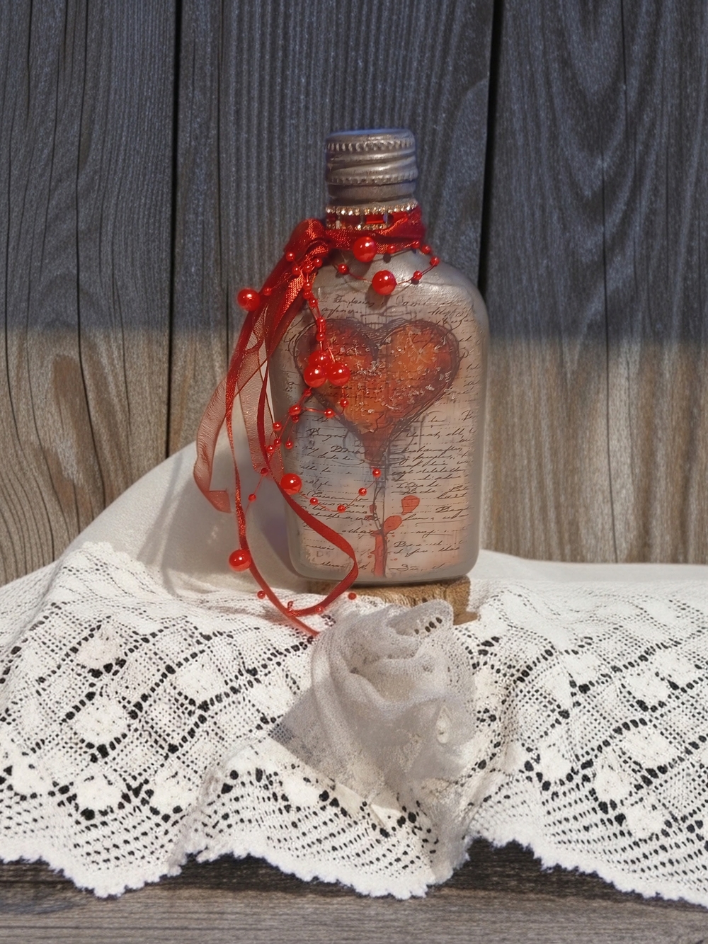 Handcrafted Heart-Embellished Decorative Bottle with Red Ribbon